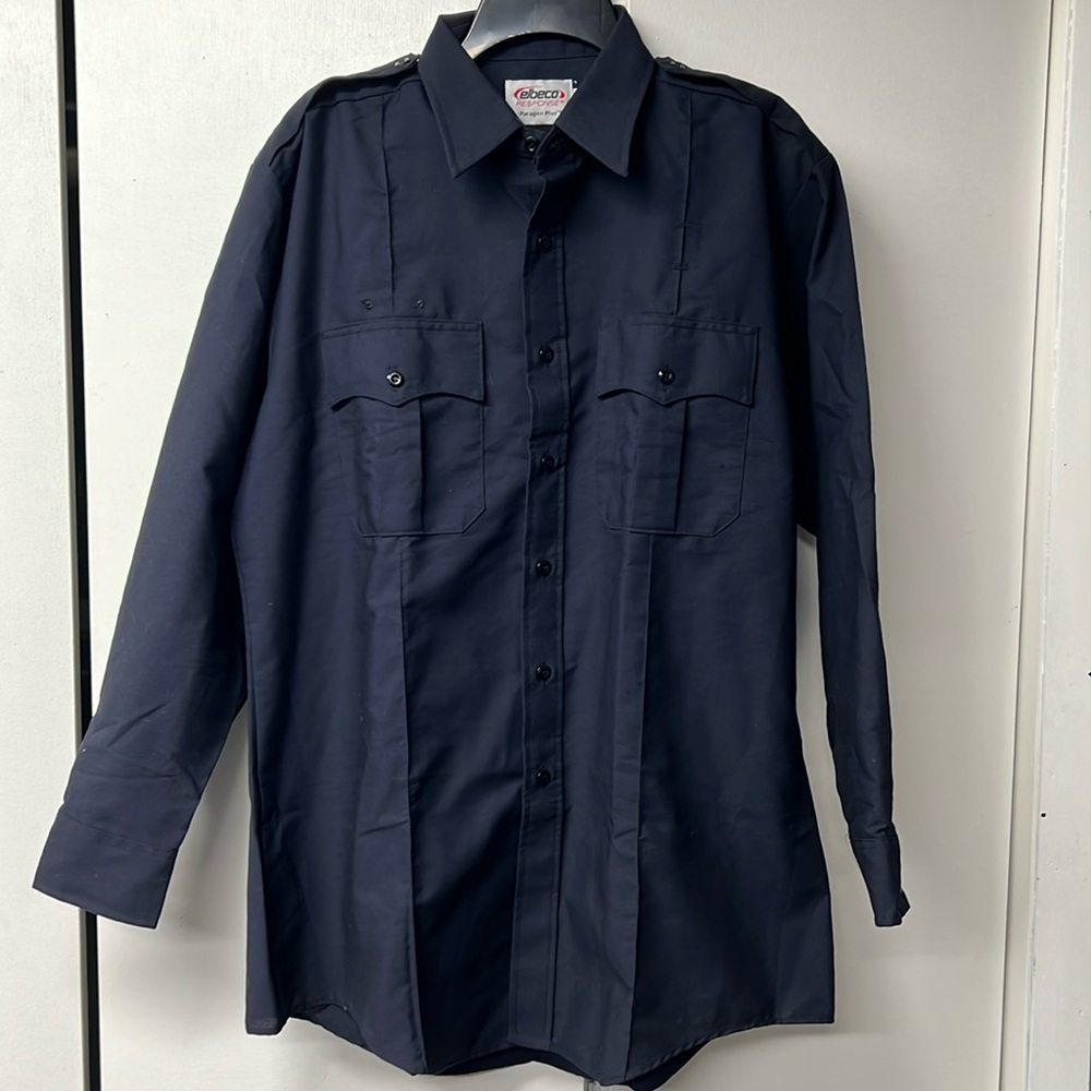 NWOT men’s uniform work shirt. Spots for name tag. Long sleeve.